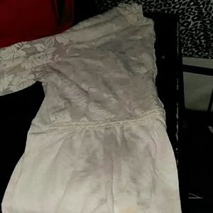 A cute white flowery long sleeve shirt